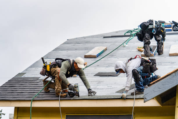 Professional Emergency Roof Repair technician working in Westhampton, NY